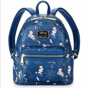 Disney Cruise line Loungefly Minnie mouse.